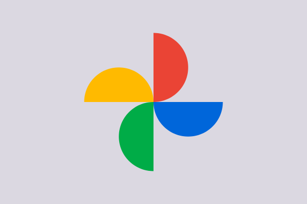 A circular logo divided into four colorful sections—red, blue, green, and yellow—resembling a pinwheel or flower on a light gray background, symbolizing the vibrant yet secure nature of a WordPress site.